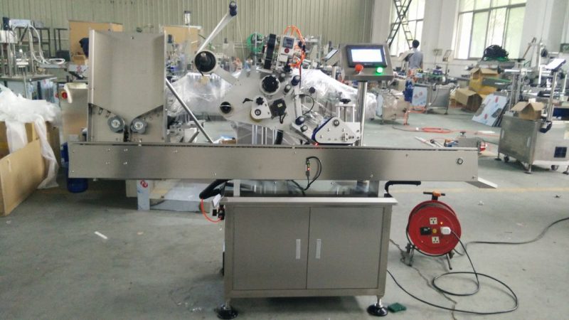 China máquina adhesiva de etiquetas redondas de pequenas latas de alta velocidade, máquina adhesiva de etiqueta de botella negra de ollo para provedor de cosméticos